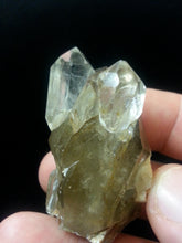 Topaz on smokey quartz, from Vietnam.